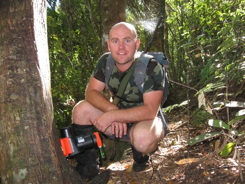 Robbie van Dam of Good Nature Traps checking one of his test lines of A24 and A12 self-setting traps on the ridge above the Sunny Grove/ Whakanui Tracks